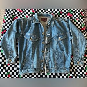 Vintage denim jacket with pink stitching and accents
